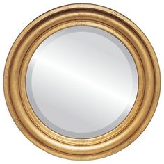 a round mirror with gold rims is shown