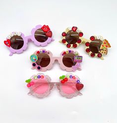 "VALENTINE'S SUNNIES!! These are so adorable-- Each pair is handcrafted by me. Using various beads, Charms, Rhinestones, and fun details! 💘 *4 options available-- Choose your style: 1. I LOVE YOU CHERRY MUCH 2. I LOVE YOU TO PIZZAS 3. LOVE STRUCK 4. XOXO * Anti-Glare * UV Protection (UVA & UVB) * Durable and shatterproof * They open and close smoothly * Each item is made to order and will be ready to ship in 5-7 business days! If you need your order sooner. Please check out my \"RUSH ORDER OPTI Fun Sunglasses For Valentine's Day Gift, Fun Sunglasses As Valentine's Day Gift, Cute Customizable Sunglasses For Gift, Fun Handmade Sunglasses As A Gift, Fun Pink Sunglasses For Gift, Handmade Fun Pink Sunglasses, Fun Handmade Pink Sunglasses, Fun Pink Handmade Sunglasses, Cute Red Sunglasses With Uv Protection