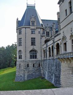 an old castle like building with a clock tower