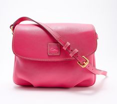 Just because it's a crossbody bag doesn't mean it can't be sleek, stylish, and sophisticated. This gorgeous bag is crafted of exquisite Florentine leather and is fashioned with a lovely front flap with a leather patch logo. From Dooney & Bourke. Classic Pink Flap Bag With Removable Pouch, Pink Satchel Shoulder Bag With Leather Lining, Pink Leather-lined Satchel Shoulder Bag, Classic Pink Bag With Magnetic Closure, Pink Leather Flap Bag For Travel, Pink Leather Flap Bag With Magnetic Closure, Leather Lined Flap Bag, Pink Leather Flap Bag, Pink Leather Crossbody Flap Bag