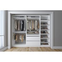 an open white closet with clothes and shoes