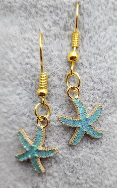 Inspired by the sea, blue starfish drop earrings. Blue Starfish, Starfish Earrings, Sea Blue, By The Sea, Starfish, The Sea, Jewelry Earrings Dangle, Etsy Earrings, Dangle Drop Earrings