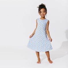 Get ready for a sprinkle of sweetness with our Milk & Cookies Blue Bamboo Girls' Sleeveless Dress! Crafted from ultra-soft bamboo fabric, this dress is as comfortable as it is adorable. Perfect for playdates, parties, or simply lounging around, it features a charming design that will make your little one smile. Treat her to the perfect blend of style and comfort with this irresistible dress. Shop now and let her indulge in the sweetness of Milk & Cookies! Perfect Fit: Tailored to suit all body t Playful Cotton Loungewear Dress, Blue Sleeveless Dress For Beach, Cute Summer Twirl Dress For Sleepover, Cute Bedtime Dresses For Summer, Sleeveless Cotton Twirl Dress For Spring, Summer Blue Twirl Dress For Playdate, Playful Sleeveless Dress For Summer Playdate, Playful Sleeveless Summer Dress For Playdate, Blue Twirl Dress For Summer Playdate