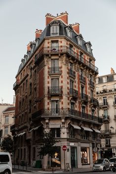 an old building with many balconies on it