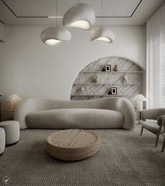 a living room filled with white furniture and lots of lights hanging from the ceiling above