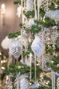 a christmas tree with ornaments hanging from it