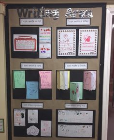 a bulletin board with writing and pictures on it