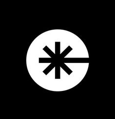 a white circle with an arrow in the center on a black background, it appears to be dark