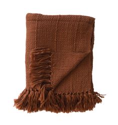 a brown blanket with fringes on it