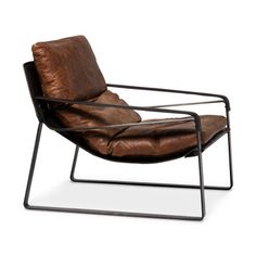 a brown leather chair sitting on top of a metal frame