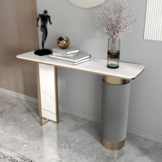 a modern console table with books and vase