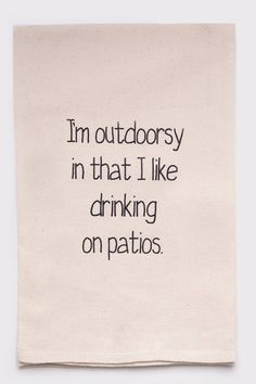 a tea towel with the words i'm outdoorsy in that i like drinking on patios