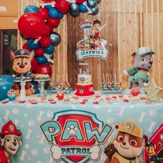 paw patrol themed birthday party with balloons and decorations