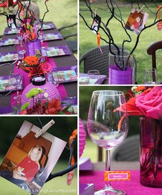 the table is set up with pictures and flowers in vases, wine glasses, and cards