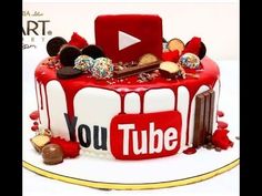 a cake that is decorated to look like a bus with the youtube logo on it