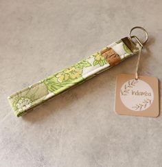 a keychain with a tag attached to it