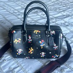 New Without Tags, Disney Characters Holiday Print, Excellent Condition Black Disney Bags With Character Print, Black Mickey Mouse Bag For Disney Fan Events, Paw Wallpaper, Coach Rogue, Coach Disney, Coach Satchel, Brown Leather Satchel, Coach 1941, Black Leather Satchel