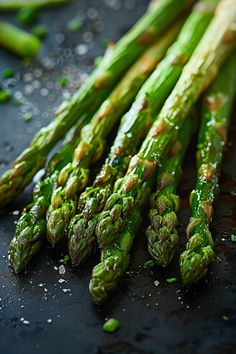 Freshly cooked asparagus spears seasoned with salt and pepper. Baked Asparagus Recipes, Asparagus Recipes Baked