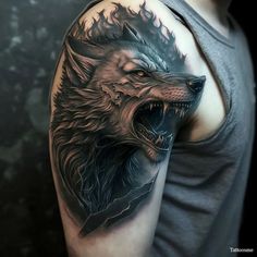 a man with a wolf tattoo on his arm