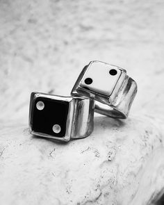 The Lucky Dice Ring was originally carved in the 1980's and has remained a favorite of high rollers ever since. These sterling silver rings are set with vintage casino dice, available in your choice of Black, White or Red. We’re betting on 2’s today, but you can choose any number you like!Roll your lucky digits every time - Just select the number you would like featured on your ring from from the drop-down menu and we'll make it happen! High Roller, Lucky Number, Mens Accessories Fashion, No 5, Black Rings, Sterling Silver Rings, Casino, Silver Rings, Fashion Accessories