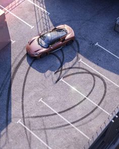 an overhead view of a car parked in a parking lot