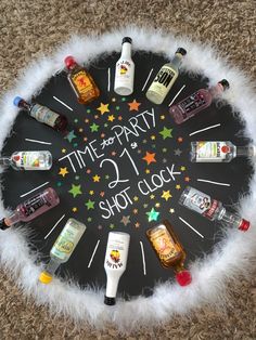 a black and white sign with bottles on it that says time to party 2 shot clock