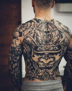 Man displays his back with a geometric warrior tattoo Shore Tattoo, Sake Tattoo, Patterns Photography, Backpiece Tattoo, Mandala Tattoos, Gangsta Tattoos