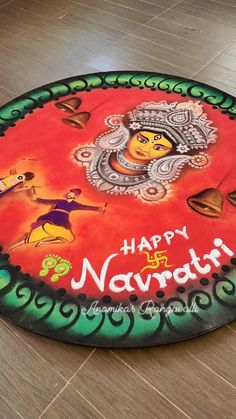 a colorful mat on the floor with happy navrath written on it and an image of lord rama