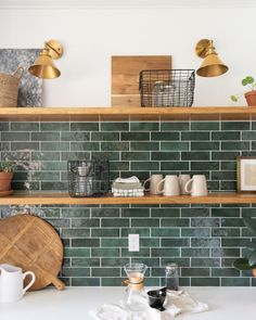 the kitchen counter is clean and ready to be used as a place for coffee or tea