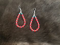 Authentic Beautiful Navajo Zuni oversized hoop earrings with Red Coral and Sterling Silver balls.  Handcrafted by Navajo Artist Harriet Crosby Great for a Gift ❤️ Earrings are 2.5" Hoop Earrings are SO popular right now.. These are perfect for Hoop Lovers! They are large enough to be seen from a far. Perfect hoops to go with Jeans and Boots! Southwestern Style Red Jewelry With Colorful Beads, Red Teardrop Jewelry For Festival, Southwestern Teardrop Jewelry For Festivals, Southwestern Style Red Festival Jewelry, Southwestern Style Red Beaded Earrings As Gift, Traditional Teardrop Jewelry With Large Beads, Festival Teardrop Jewelry With Large Beads, Southwestern Jewelry With Round Beads For Pierced Ears, Southwestern Red Beaded Earrings As Gift