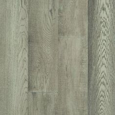 an image of wood flooring that looks like it has been painted in light gray