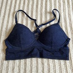 Nwt!! Navy Blue Victorias Secret Lace Bralette. No Underwriting But This Light Padding Is Perfect. The Lace And Band In The Back Is Stretchy For Max Comfort And The Straps Are Also Adjustable. There Seems To Be A Small Amount Of Snag On The Inside Where The Straps Meet, But Otherwise In Perfect Condition. Fits True To Size In My Opinion. Let Me Know If You Have Any Questions! *Comes From A Dog Friendly Home. Blue Bra, Lace Bralette, Dog Friendly, Dog Friends, Fashion Ideas, A Dog, Women's Intimates, Bralette, Jay