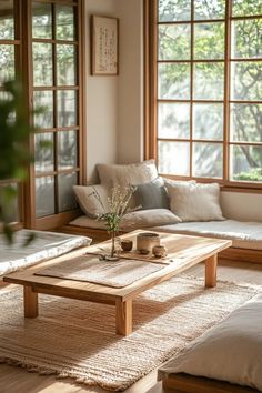 Sunlit Japandi living room showcasing natural materials, woven textures, and a perfect balance of form and function Japanese Style Coffee Table, Japanese Home Style, Scandinavian Japanese Interior, Japanese Style Table, Interior Design Japandi, Japandi Home Office, Japandi Style Living Room, Home Office Nook, Calm Living Room