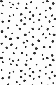 black and white polka dots on a white background