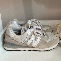 Shop jessicacooney14's closet or find the perfect look from millions of stylists. Fast shipping and buyer protection. taupe colored New Balance classic 574s New Balance White, Taupe Color, Tennis Shoes, Womens Shoes Sneakers, New Balance, Tennis, Shoes Sneakers, Women Shoes, Sneakers