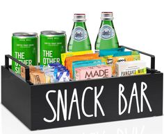 a snack bar with snacks and sodas in the tray that says snack bar on it