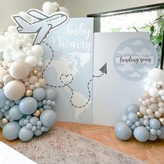 balloons are arranged in the shape of an airplane