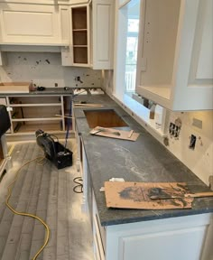 the kitchen is being remodeled with new cabinets and counter tops, but no one will be able to use it