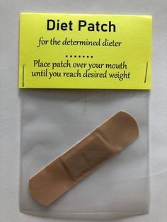 a piece of cloth with a label on it that says, diet patch for the determined diaper place patch over your mouth until you reach desired weight