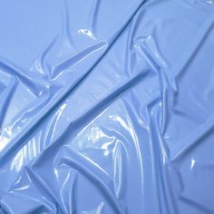 an image of blue plastic material that looks like it could be used as a background