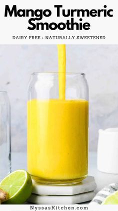 a glass filled with mango turment smoothie