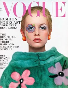 a woman with flowers painted on her face is featured in the cover of a magazine