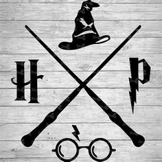 harry potter's hat, wands and glasses on a wooden background with the word hp