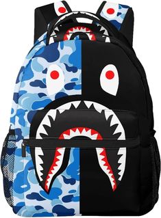 The Shark Print Camo Travel Laptop Backpack offers a sleek and stylish design with a unique shark print camo pattern. Made specifically for travelers, this backpack features a spacious main compartment to fit all your essentials and a padded laptop pocket for secure storage. Its durable material and adjustable straps make it a convenient and reliable choice for any journey. Premium Material: Cute Shark Print Backpack,Made By High-Quality Lightweight And Waterproof Material.Water Resistant And Easy To Wipe Clean. And Boast Smoothly Running Heavy-Duty Iron Zippers With Strong Lock Slot On The Zipper. Large Capacity:11.5"(L) X8"(W) X16"(H) inch.The Capacity Is Large Enough To Accommodate Large School Bags For Teens, Pretty Backpacks, Black And White Camo, Black Backpacks, Bape Shark, Big Backpacks, Backpacks Travel, Shark Print, Red Camo