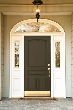 a front door with a light on above it