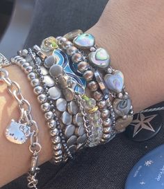 Outfit Inspo Jewerly, Lots Of Silver Jewelry Aesthetic, Lots Of Bracelets On Wrist Aesthetic, Silver Jewelry Stacking, Silver Jewellery Layering, Chunky Bracelets Aesthetic, Vintage Bracelet Stack, Y2k Bracelets Aesthetic, Wearing A Lot Of Bracelets