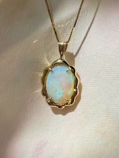 One of a kind incredible 4.84 ct. Australian Opal pendant, hugged by solid 14k yellow gold. Stone Necklace Pendant, One Of A Kind Jewelry, Opal Aesthetic, Opal Accessories, Opal Necklaces, Pendant Jewelry Design, Cosmic Jewelry, Australian Opal Pendant, Opal Solitaire Ring