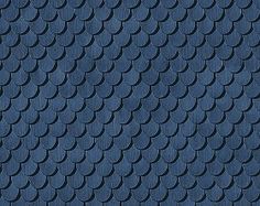 an image of a blue textured surface with fish scales on the top and bottom