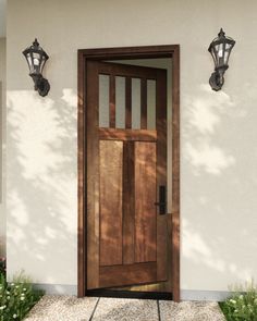 a wooden door sitting next to a light on the side of a white building with two lamps