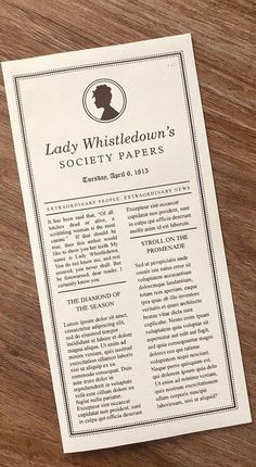 the lady whisldlow's society papers on top of a wooden table